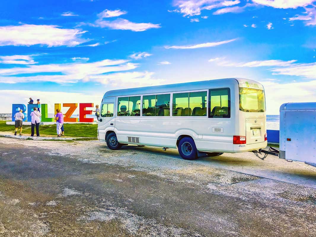 The 32 passenger bus with a group arriving to Belize